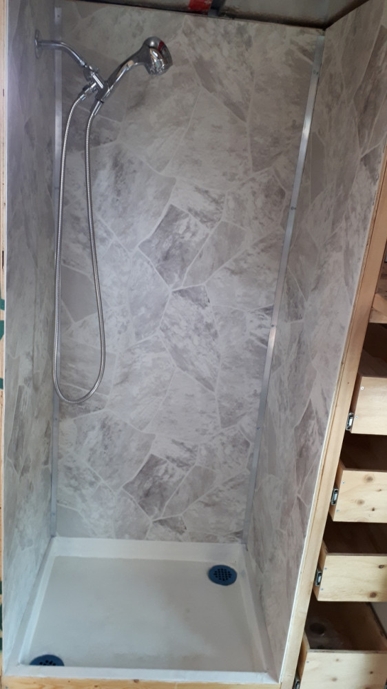 Our vinyl sheeted shower stall.