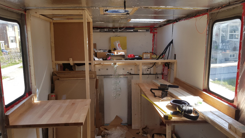 Both kitchen counters cut and placed. Not yet affixed though until we get the cabinets in.