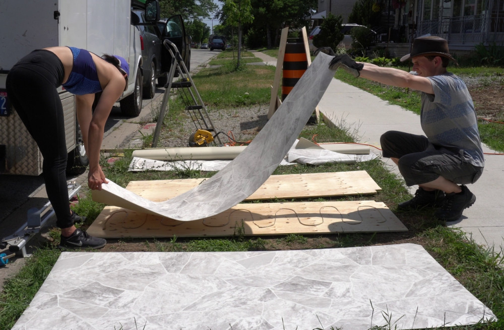 Then it's time to align the vinyl sheet to the plywood.