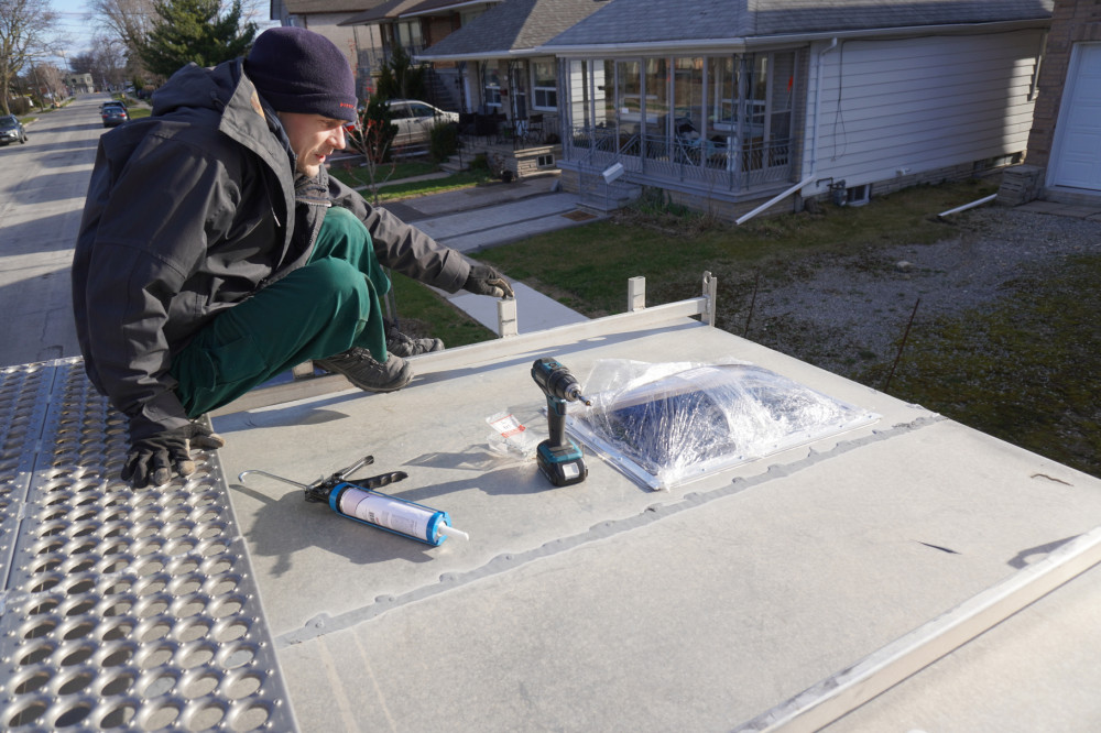 Fitting the skylight from the outside.